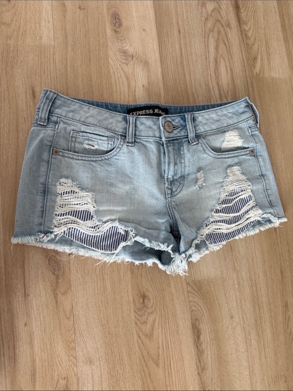 Express Light Blue Distressed Denim Shorts with Striped Underlay